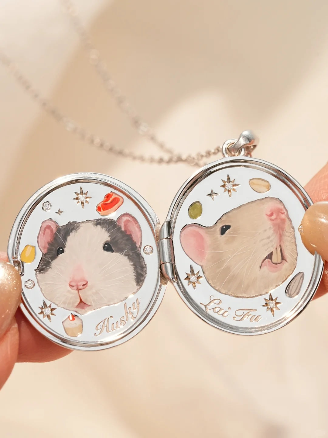 Open custom pet portrait locket with painted miniature portraits
