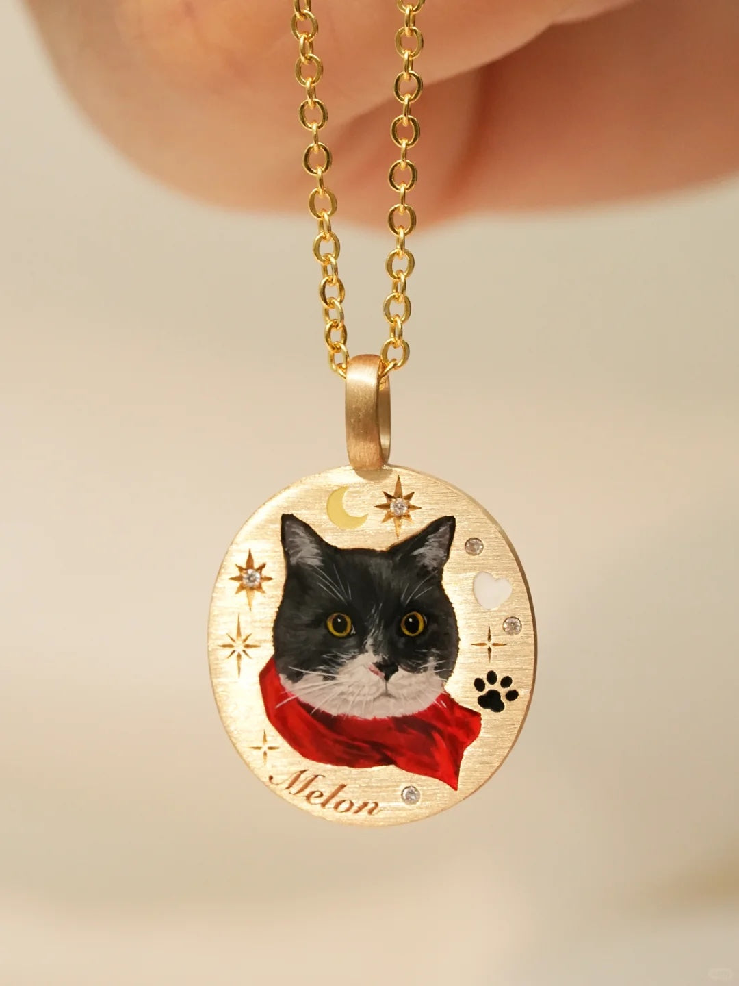 Custom pet portrait pendant necklace with a painted cat portrait